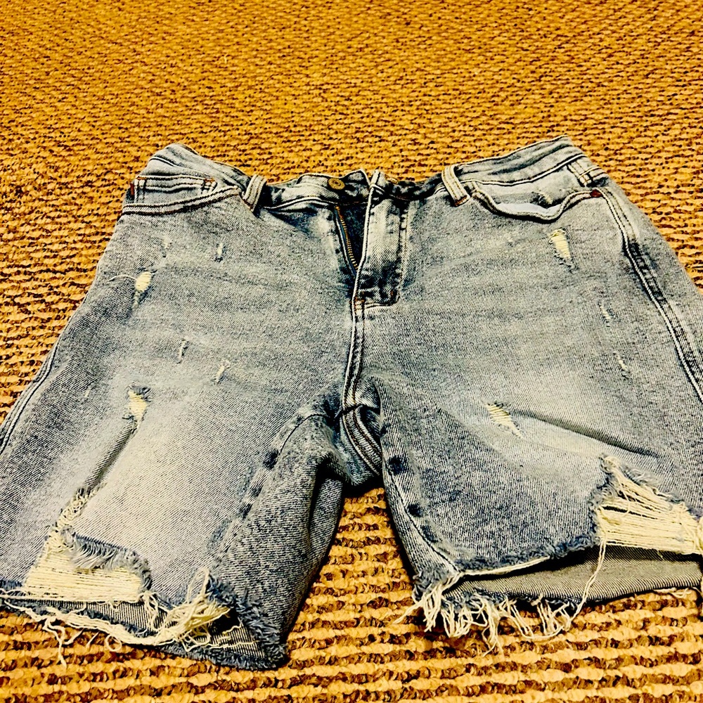 Judy blue shorts. Distressed and faded. Sz. L